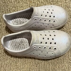 People water shoes iridescent